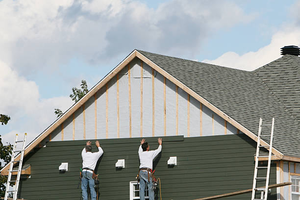 Professional Siding Contractor technician working in Washington, DC